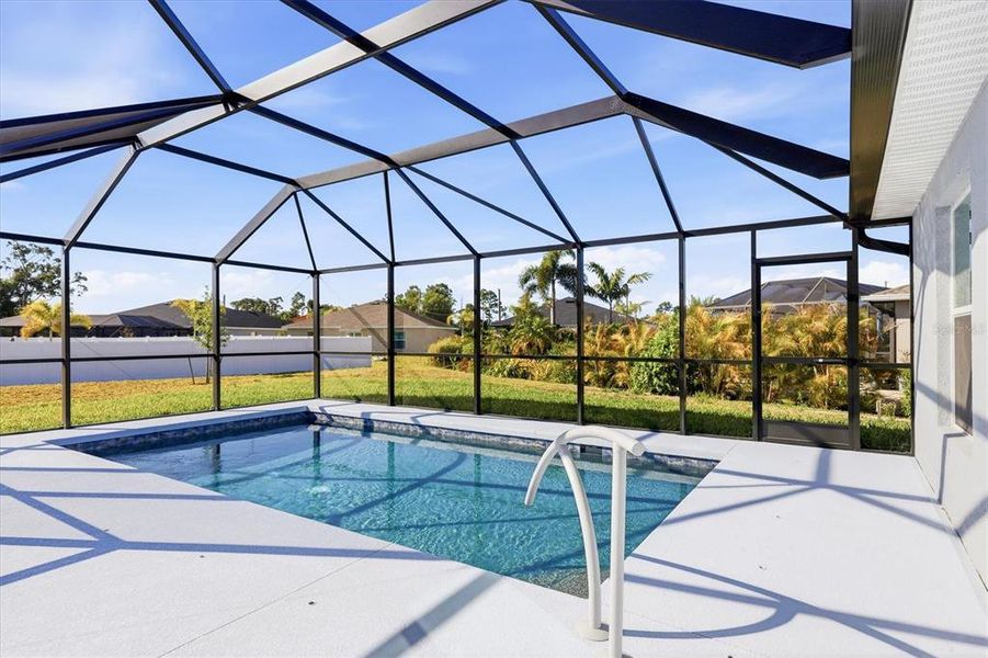 Exterior details and patio area of a home in Rotonda Lakes, Rotonda West (Image 21).