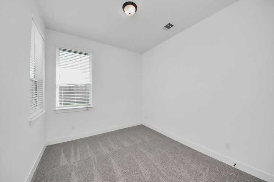 Representative unfurnished interior of a home built from the Summerton by Chesmar Homes in Meridiana 50's and 60's, Manvel (Image 59).
