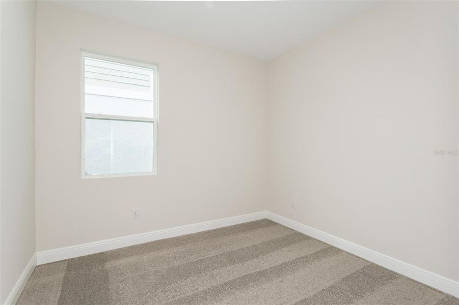 Spacious, unfurnished interior of a new home in Pasadena Woods, Dade City (Image 10).