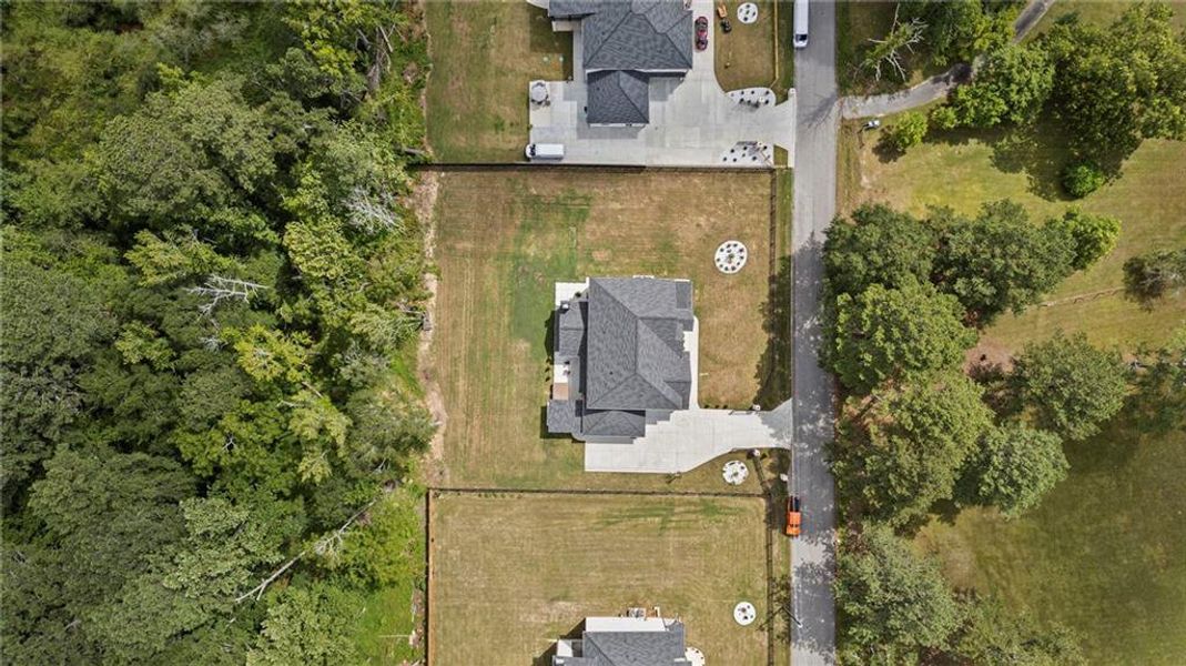 Front exterior of a new home in , Lawrenceville, GA, highlighting curb appeal (Image 23).