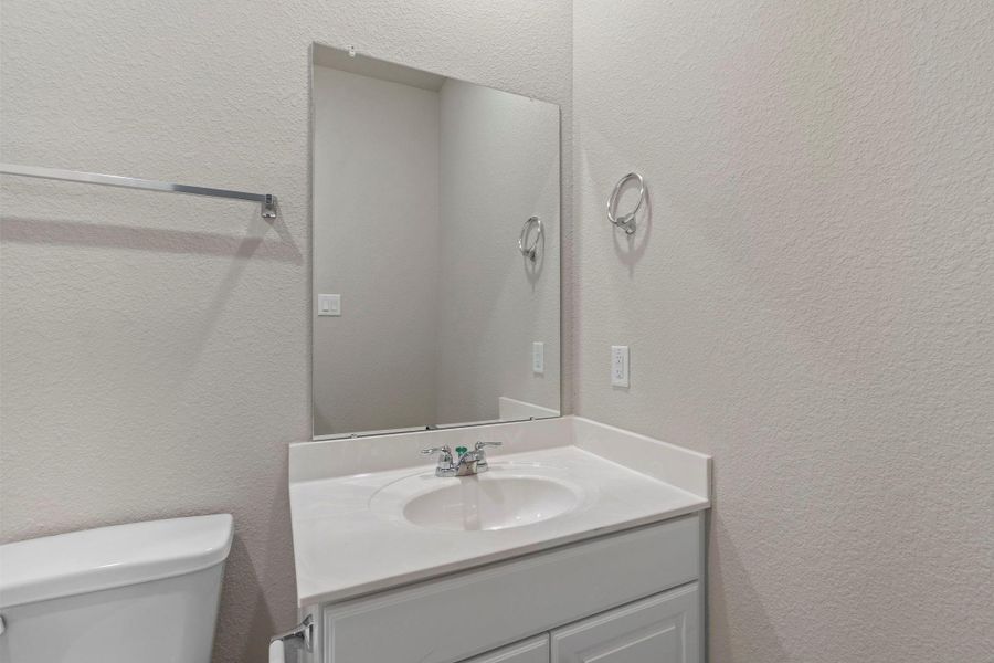 The secondary bath features tile flooring, white cabinetry and light countertops and a shower/tub combo. Perfect for accommodating any visiting family and friends. The secondary bath features tile flooring, white cabinetry and light countertops and a shower/tub combo. Perfect for accommodating any visiting family and friends.