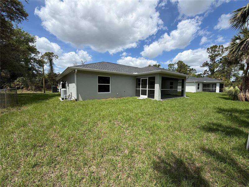 Exterior details and patio area of a home in , North Port (Image 22).