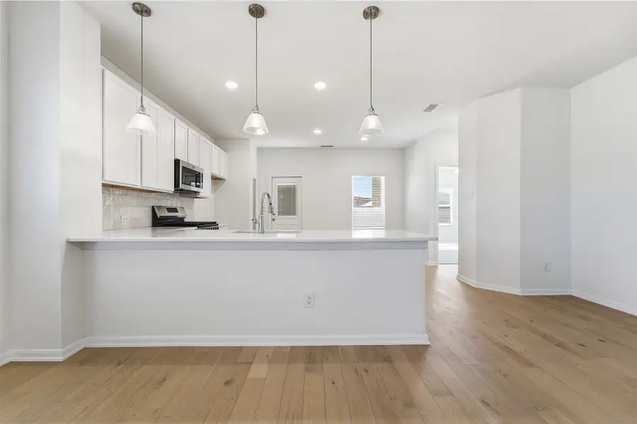Furnished interior view inside a new home in Pebblebrook, Sherman (Image 5).