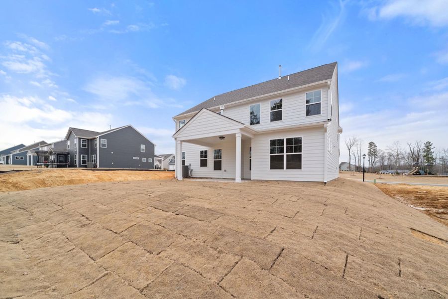 Exterior details and patio area of a home in Wexford, Elon (Image 27).