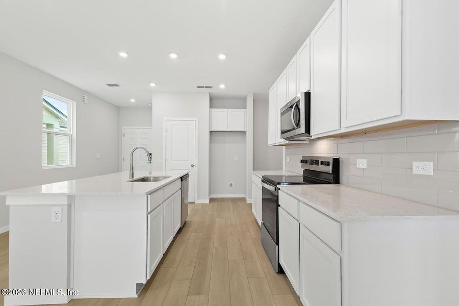 Furnished interior view inside a new home in The Landings at Pecan Park, Jacksonville (Image 5).