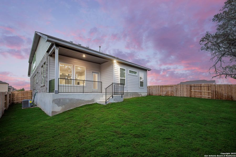 Exterior details and patio area of a home in Buffalo Crossing – New Phase Now Preselling, Cibolo (Image 2).