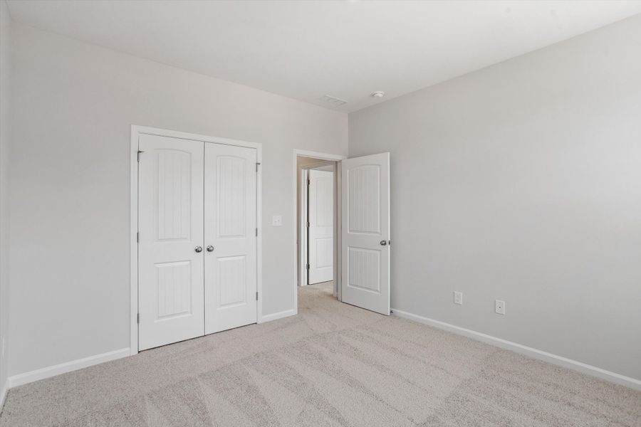 Spacious, unfurnished interior of a new home in Sweetbrier, Durham (Image 30).