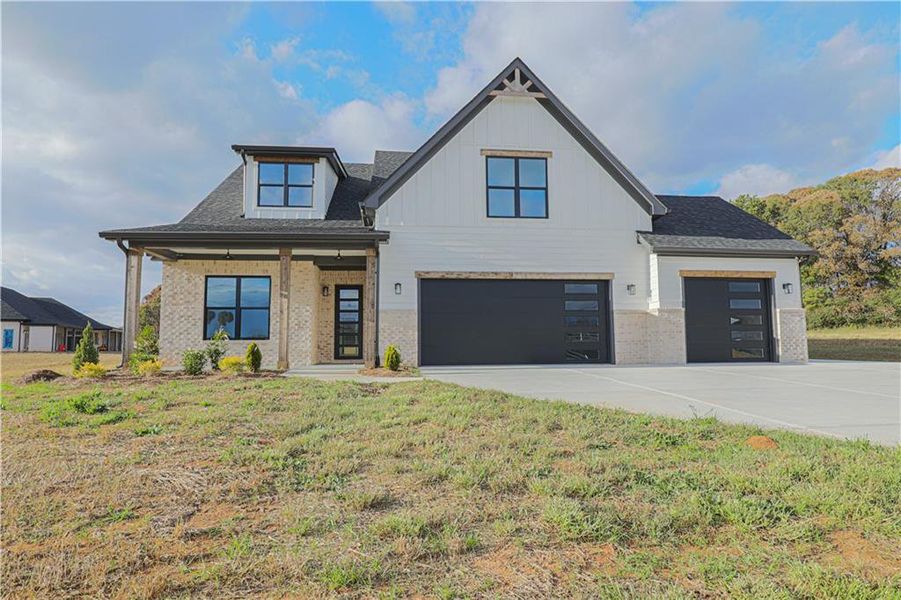 Front exterior of a new home in , Maysville, GA, highlighting curb appeal (Image 23). Front exterior of a new home in , Maysville, GA, highlighting curb appeal (Image 23).