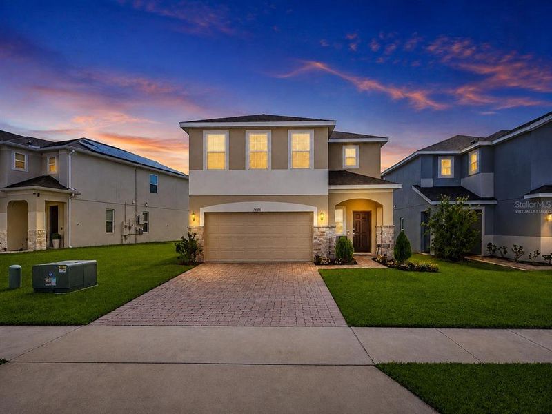 Front exterior of a new home in , Kissimmee, FL, highlighting curb appeal (Image 23). Front exterior of a new home in , Kissimmee, FL, highlighting curb appeal (Image 23).