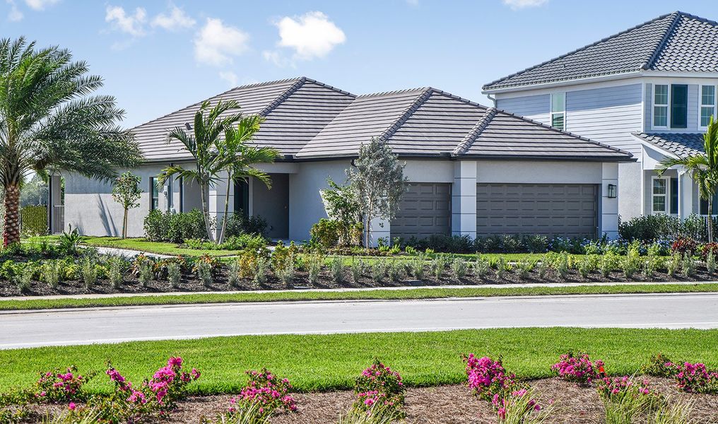 Representative exterior photo of a completed home built from the Meadow Brook by Neal Communities in SkySail, Naples, FL (Image 19).