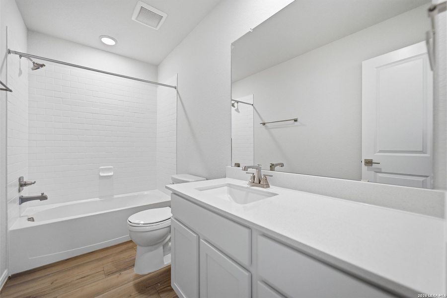 Furnished interior view inside a new home in The Woodlands at Medina Hills, Mico (Image 5).