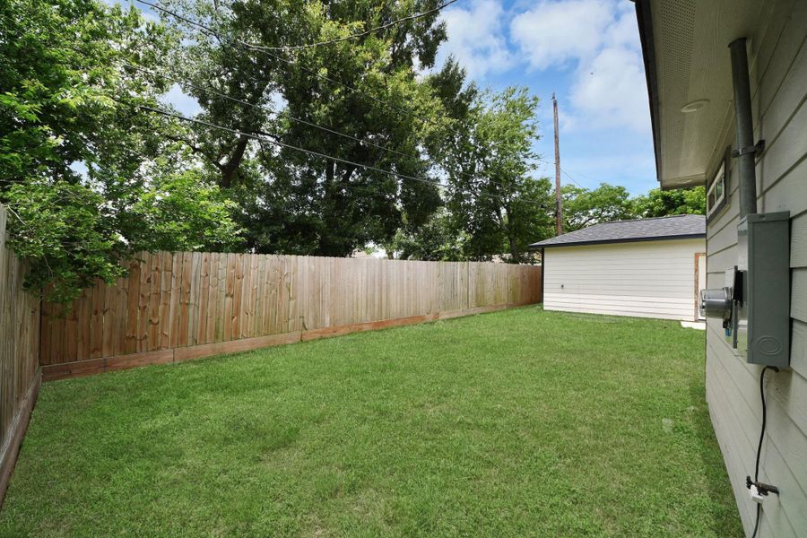 Exterior details and patio area of a home in , Houston (Image 4).