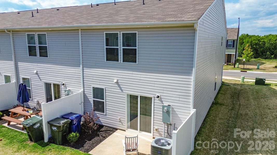 Exterior details and patio area of a home in Trivium, Newton (Image 3).