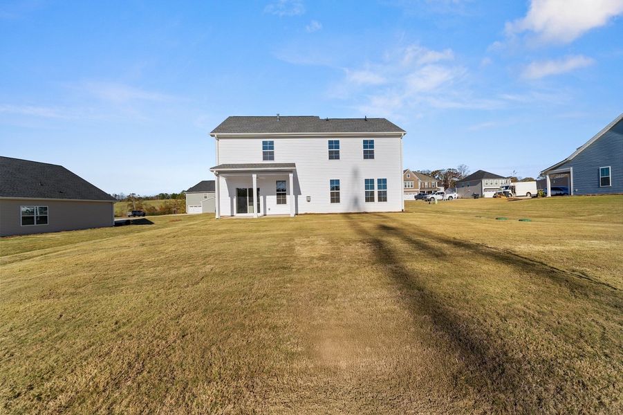 Exterior details and patio area of a home in Foxhall Landing, Easley (Image 4).