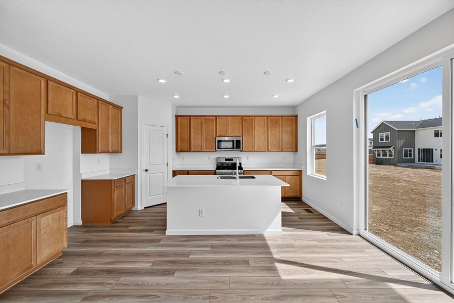 Furnished interior view inside a new home in Sky Ranch, Aurora (Image 3).