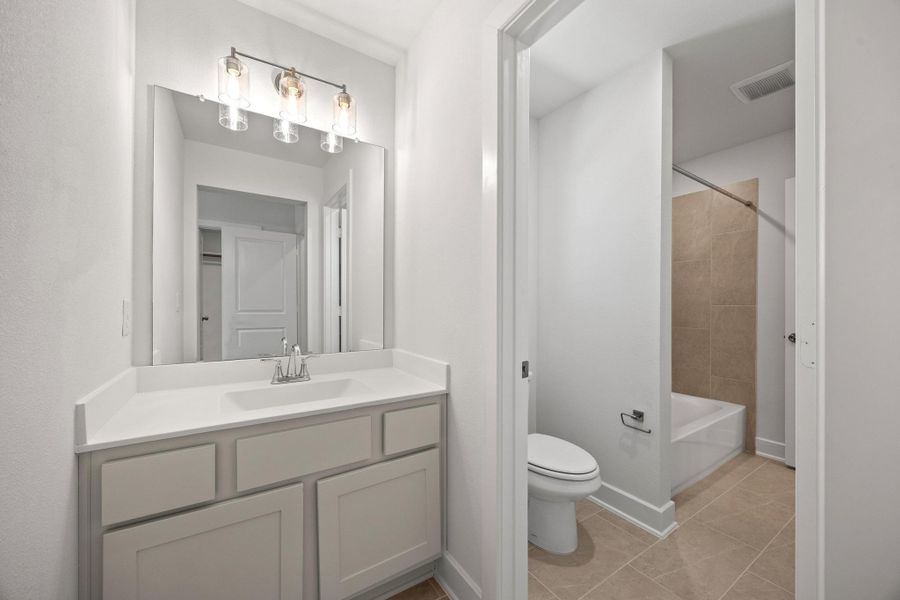 Furnished interior view inside a new home in Parmer Ranch, Georgetown (Image 11).