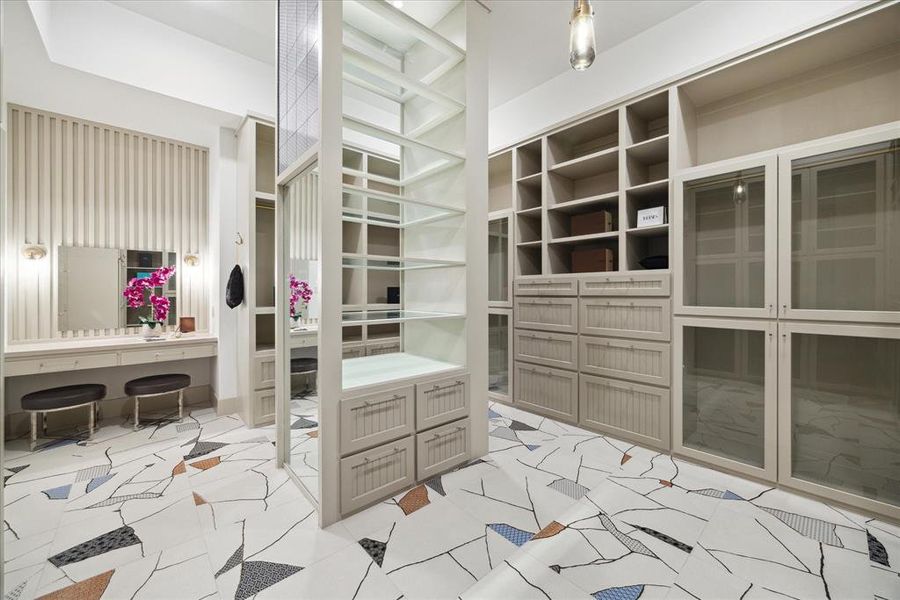 The designated closet for her is designed to make everyone envious, offering abundant storage space and ample room to showcase your luxury handbags.