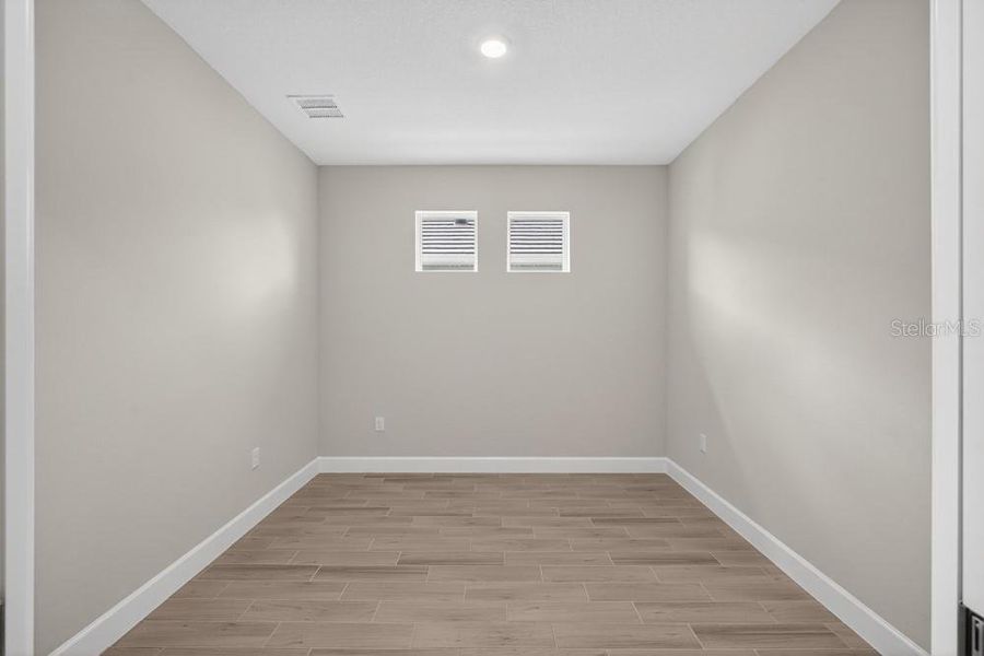 Spacious, unfurnished interior of a new home in Esplanade at Wiregrass Ranch, Wesley Chapel (Image 28).