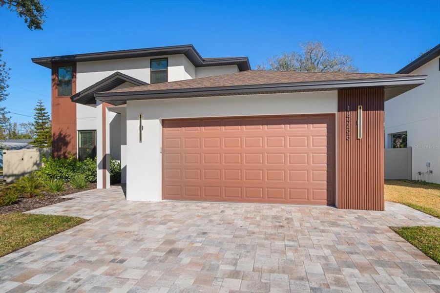 Front exterior of a new home in , Largo, FL, highlighting curb appeal (Image 27).