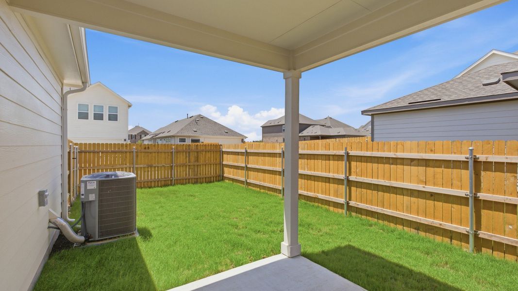 Exterior details and patio area of a home in Creeks Crossing, Elgin (Image 3). Exterior details and patio area of a home in Creeks Crossing, Elgin (Image 3).