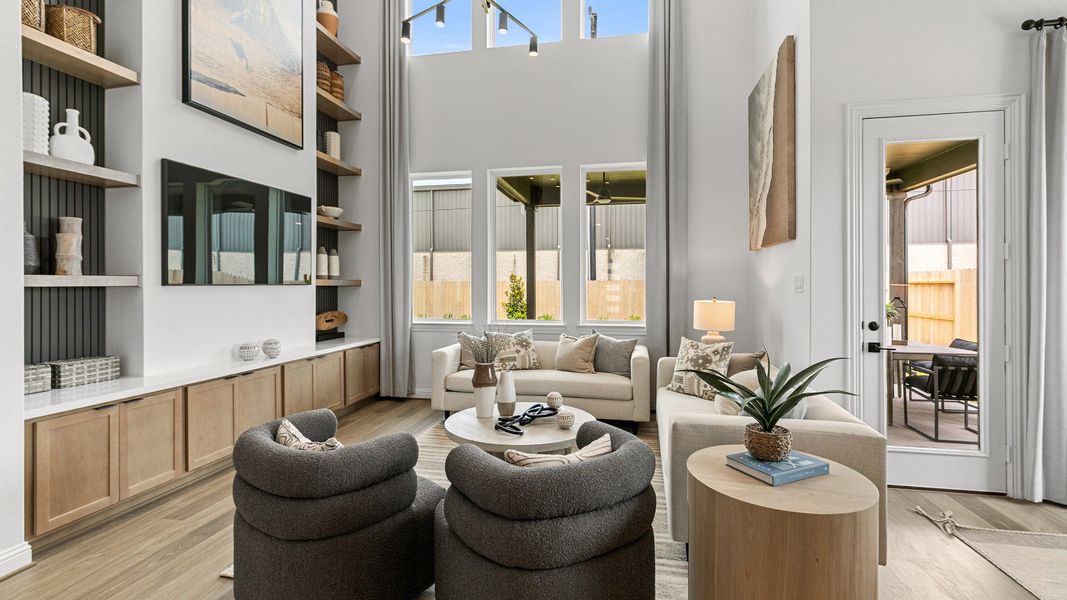 Representative furnished interior of a home built from the Magnolia by Brightland Homes in Sunterra, Katy (Image 8).