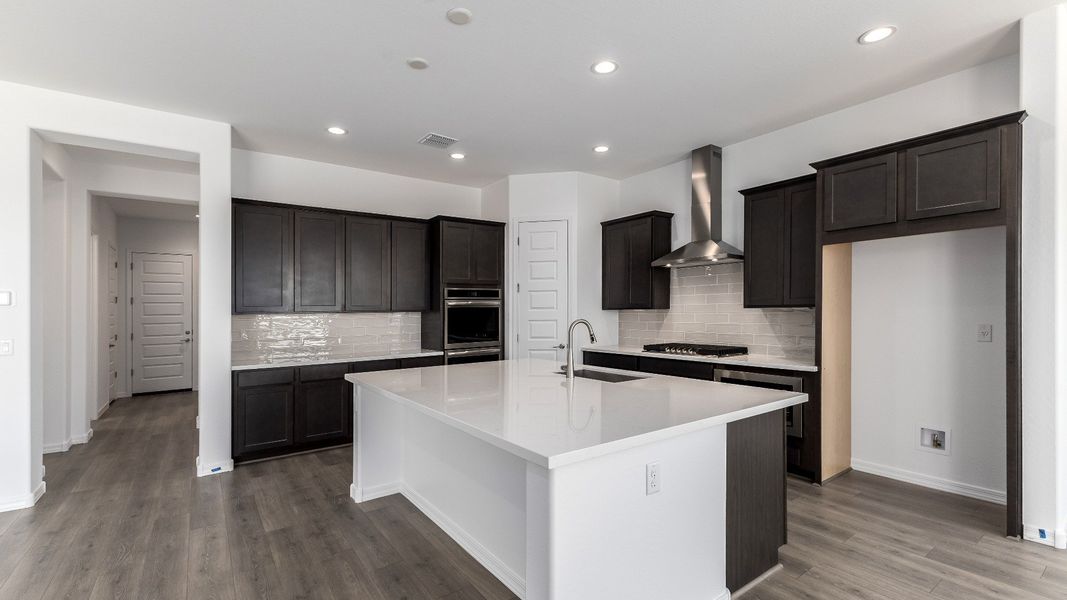 Furnished interior view inside a new home in Windrose, Waddell (Image 9).