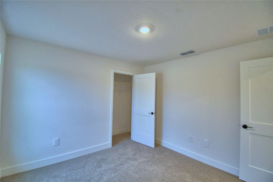 Spacious, unfurnished interior of a new home in Cadence Crossing, Auburndale (Image 42).