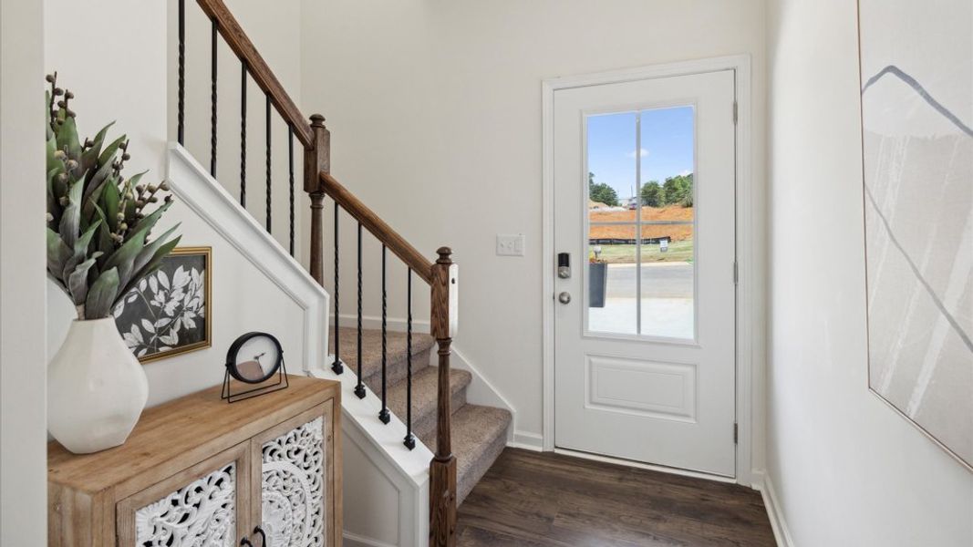 Representative furnished interior of a home built from the Altamont Townhome by D.R. Horton in Saint Marc's, Powell (Image 13).