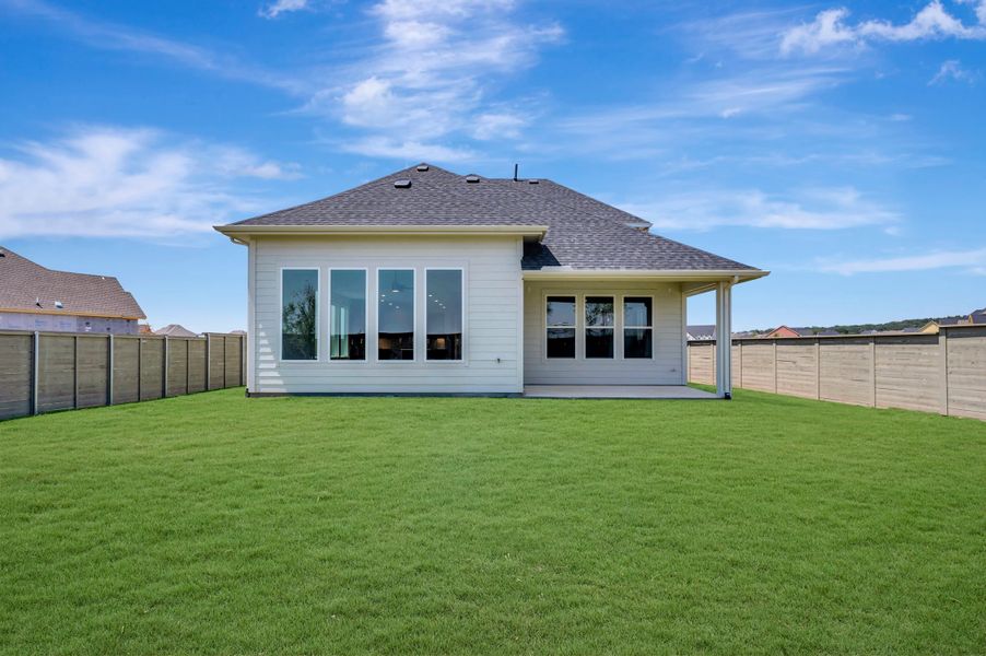 Exterior details and patio area of a home in Landmark, Denton (Image 19).