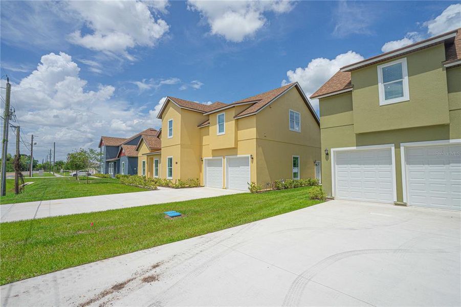 Front exterior of a new home in , Sanford, FL, highlighting curb appeal (Image 25).