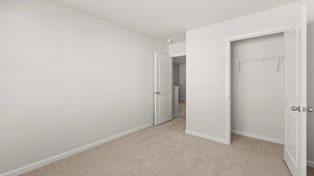 Spacious, unfurnished interior of a new home in Byrd Village, Graniteville (Image 25).