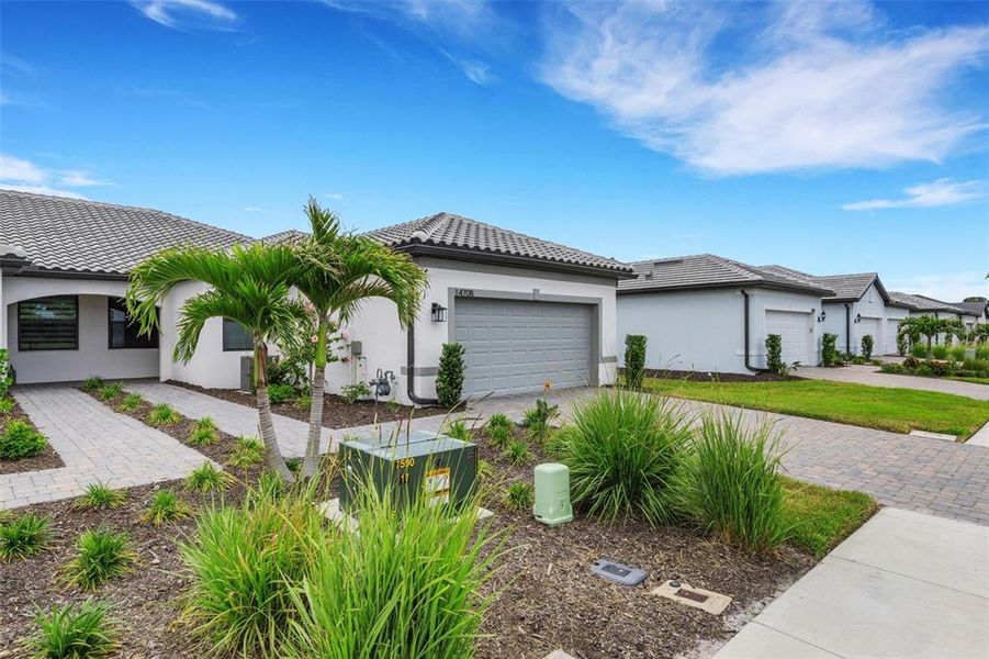 Front exterior of a new home in , Nokomis, FL, highlighting curb appeal (Image 28).
