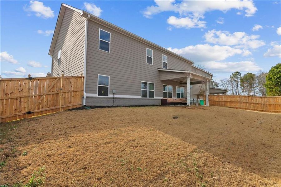 Exterior details and patio area of a home in Enclave at Brookside Crossing, Auburn (Image 3).
