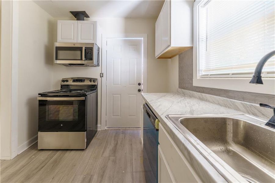 Furnished interior view inside a new home in , Atlanta (Image 8).