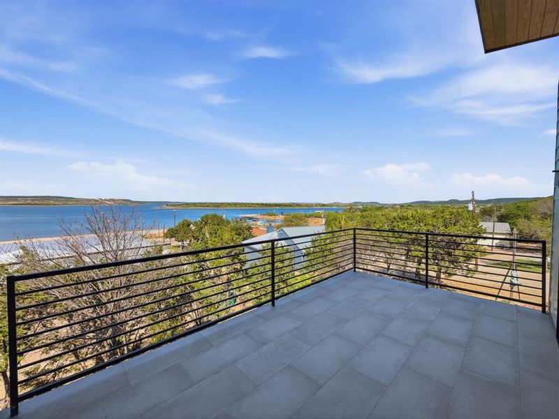 Exterior details and patio area of a home in , Graford (Image 17).