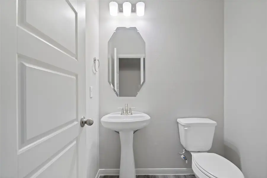 Furnished interior view inside a new home in Sunterra, Katy (Image 9).