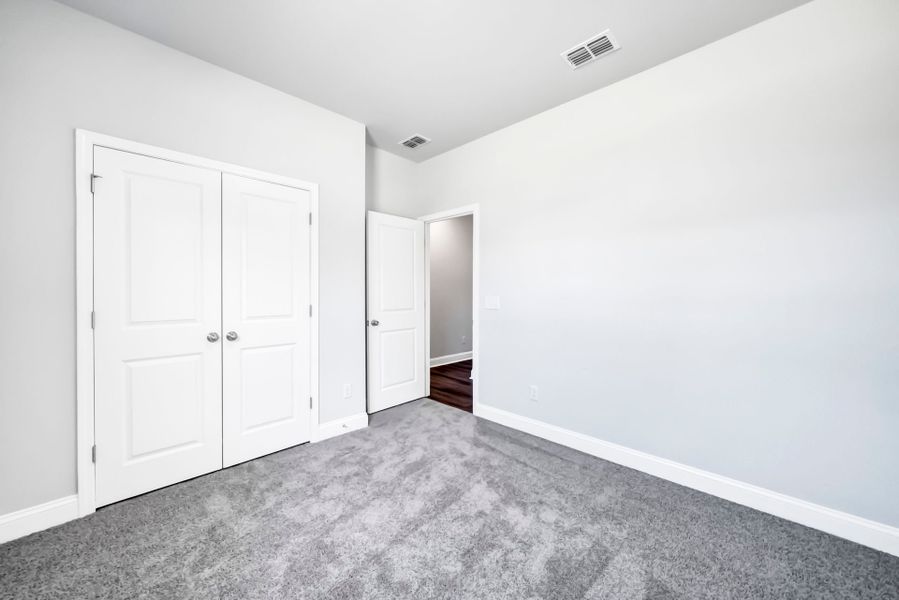 Spacious, unfurnished interior of a new home in Monroe Preserve, Chapin (Image 62).
