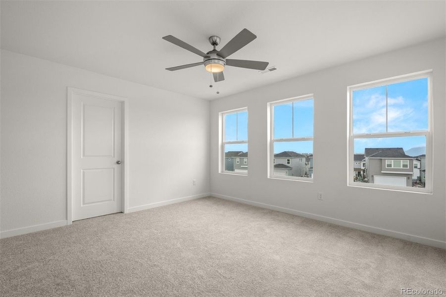 Spacious, unfurnished interior of a new home in Revel Crossing at Wolf Ranch – The Ascent Collection, Colorado Springs (Image 23).