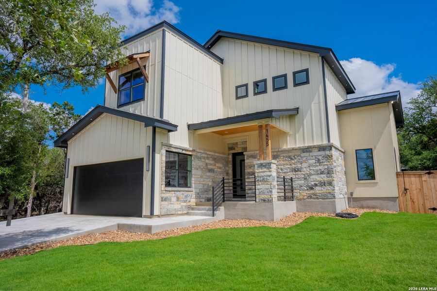 Front exterior of a new home in , Spring Branch, TX, highlighting curb appeal (Image 21).