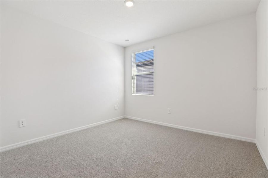 Spacious, unfurnished interior of a new home in Bradbury Creek - Signature Series, Haines City (Image 21).