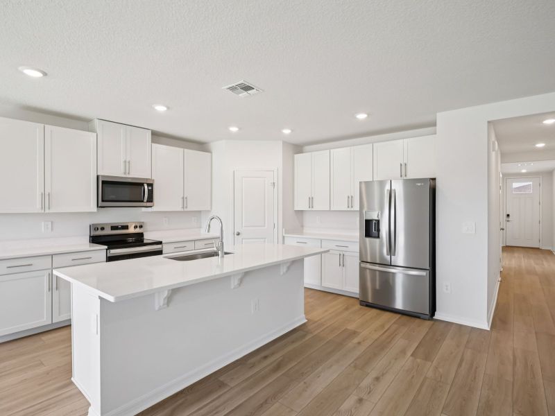 Furnished interior view inside a new home in Oakfield Trails - Classic Series, Parrish (Image 3).