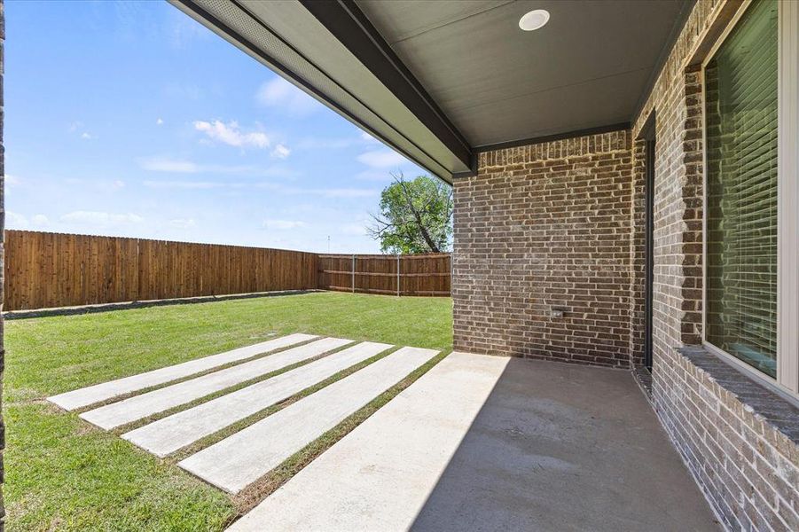 Exterior details and patio area of a home in , Fate (Image 3).