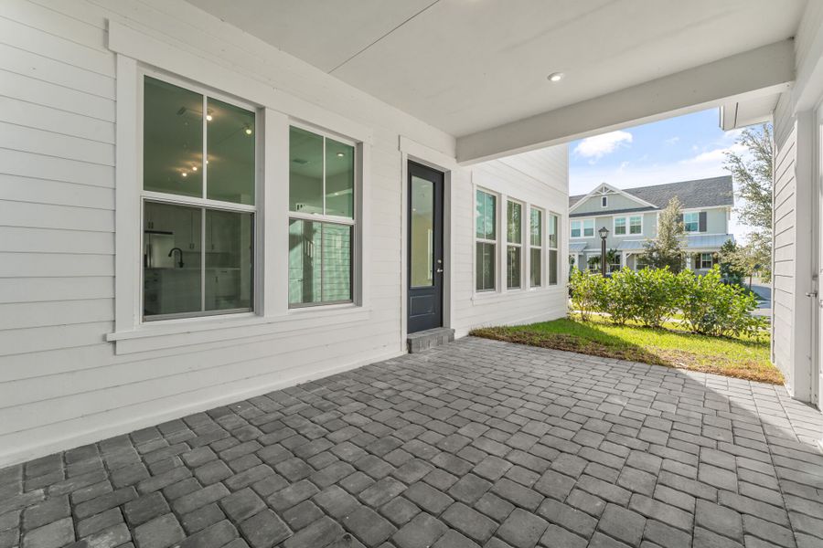 Exterior details and patio area of a home in Newfield - Rosette Park, Palm City (Image 3).