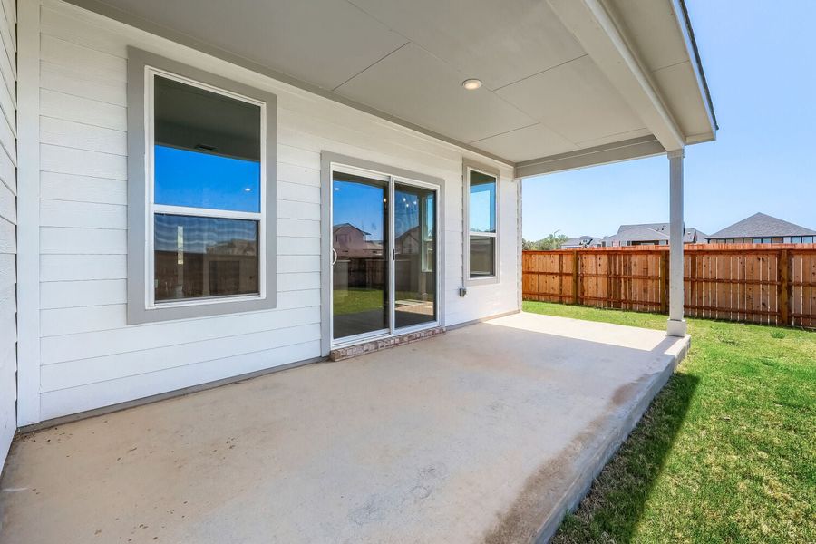 Exterior details and patio area of a home in Freedom at Anthem, Kyle (Image 4). Exterior details and patio area of a home in Freedom at Anthem, Kyle (Image 4).