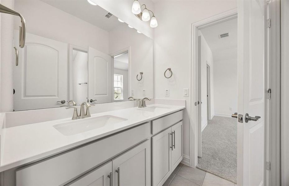 Secondary bath featuring double vanity