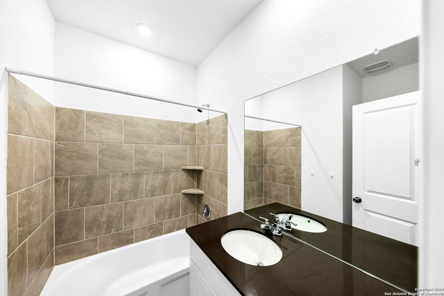 Furnished interior view inside a new home in , Bulverde (Image 6).