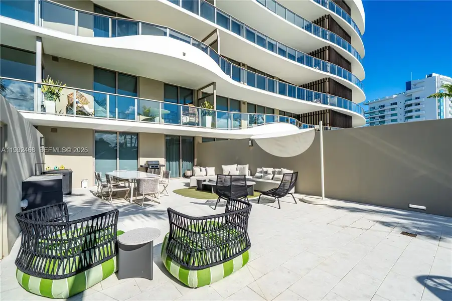 Condo located in Bay Harbor Islands, FL showcasing its design and architecture (Image 3).