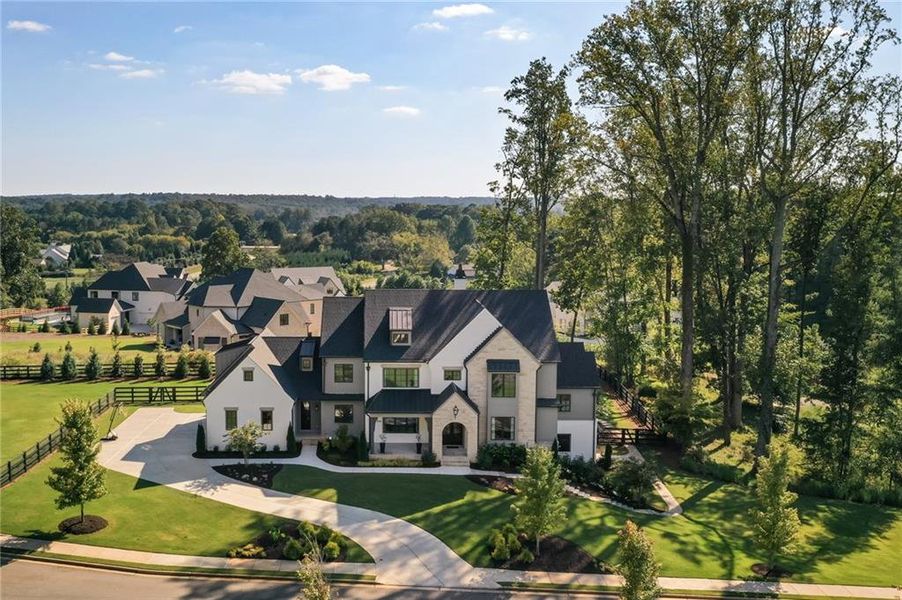 Front exterior of a new home in , Milton, GA, highlighting curb appeal (Image 32).