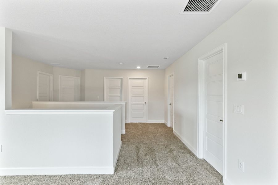 Representative unfurnished interior of a home built from the 2705 by Adams Homes in Winding Oaks, Weeki Wachee (Image 29).