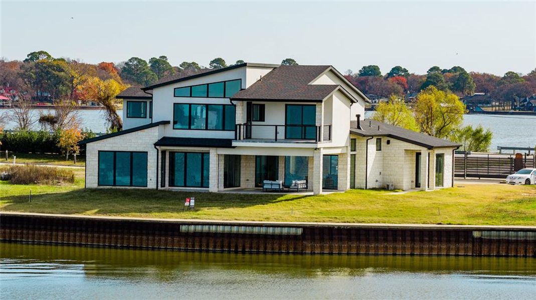Front exterior of a new home in , Gun Barrel City, TX, highlighting curb appeal (Image 2). Front exterior of a new home in , Gun Barrel City, TX, highlighting curb appeal (Image 2).